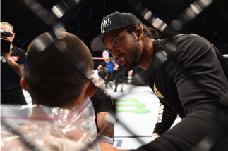 KRAKOW, POLAND - APRIL 11: (R-L) former UFC lightweight champion Benson Henderson coaches Yaotzin Meza of the United States between rounds of his featherweight fight against Damian Stasiak of Poland during the UFC Fight Night event at the Tauron Arena on