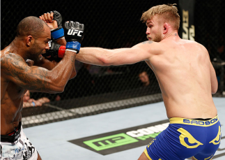 LONDON, ENGLAND - MARCH 08: (R-L) Alexander Gustafsson punches Jimi Manuwa in their light heavyweight fight during the UFC Fight Night London event at the O2 Arena on March 8, 2014 in London, England. (Photo by Josh Hedges/Zuffa LLC/Zuffa LLC via Getty I