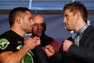 SACRAMENTO, CA - DECEMBER 12: (L-R) Opponents Chad Mendes and Nik Lentz face off during the final pre-fight press conference before the UFC on FOX event at Sleep Train Arena on December 12, 2013 in Sacramento, California. (Photo by Josh Hedges/Zuffa LLC/