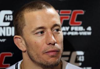 LAS VEGAS, NV - FEBRUARY 01: Georges St-Pierre answers questions from the media before the UFC 143 open workouts at Mandalay Bay Events Center on February 1, 2012 in Las Vegas, United States. (Photo by Josh Hedges/Zuffa LLC/Zuffa LLC via Getty Images) *