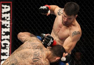 STOCKHOLM, SWEDEN - APRIL 14: (R-L) Brian Stann punches Alessio Sakara during their middleweight bout at the UFC on Fuel TV event at Ericsson Globe on April 14, 2012 in Stockholm, Sweden. (Photo by Josh Hedges/Zuffa LLC/Zuffa LLC via Getty Images)