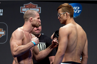 MILWAUKEE, WI - AUGUST 30: (L-R) Pascal Krauss and Hyun Gyu Lim face off during the UFC 164 weigh-in inside the BMO Harris Bradley Center on August 30, 2013 in Milwaukee, Wisconsin. (Photo by Ed Mulholland/Zuffa LLC/Zuffa LLC via Getty Images) *** Local