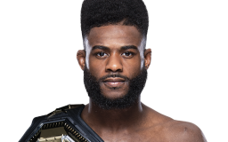 UFC bantamweight champion Aljamain Sterling profile image with belt