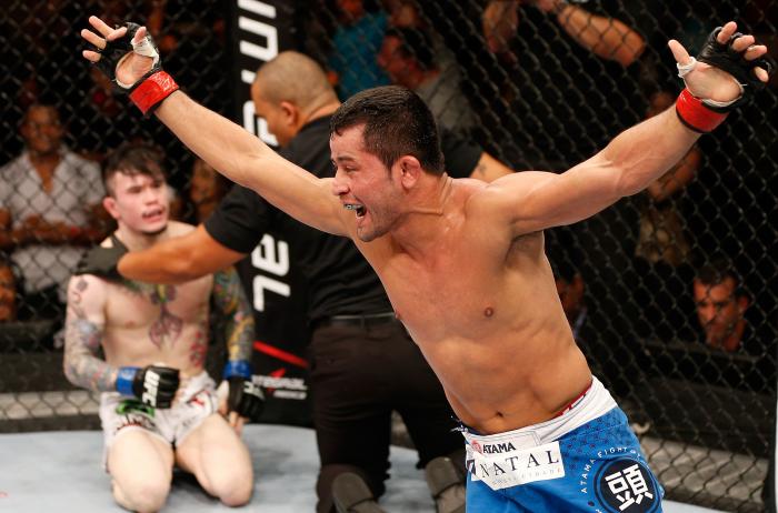 NATAL, BRAZIL - MARCH 23: Jussier Formiga reacts after his submission victory over Scott Jorgensen in their flyweight bout during the UFC Fight Night event at Ginasio Nelio Dias on March 23, 2014 in Natal, Brazil. (Photo by Josh Hedges/Zuffa LLC via Getty Images)