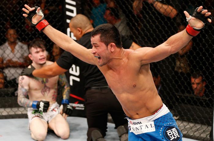 NATAL, BRAZIL - MARCH 23:  Jussier Formiga reacts after his submission victory over Scott Jorgensen in their flyweight bout during the UFC Fight Night event at Ginasio Nelio Dias on March 23, 2014 in Natal, Brazil. (Photo by Josh Hedges/Zuffa LLC via Getty Images)