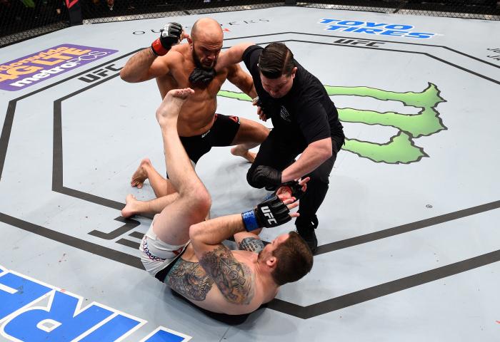 BOSTON, MA - JANUARY 17:  The referee moves in to stop the fight as Ilir Latifi (L) of Sweden defeats Sean OConnell (R) in their light heavyweight bout during the UFC Fight Night event inside TD Garden on January 17, 2016 in Boston, Massachusetts. (Photo by Jeff Bottari/Zuffa LLC via Getty Images)