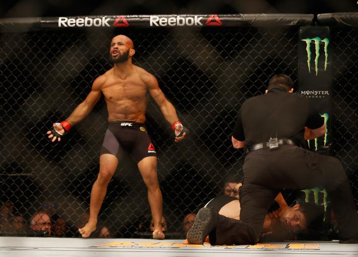 LAS VEGAS, NV - APRIL 23: Demetrious Johnson celebrates his TKO victory over Henry Cejudo in their flyweight championship bout during the UFC 197 event inside MGM Grand Garden Arena on April 23, 2016 in Las Vegas, Nevada. (Photo by Christian Petersen/Zuffa LLC/Zuffa LLC via Getty Images)