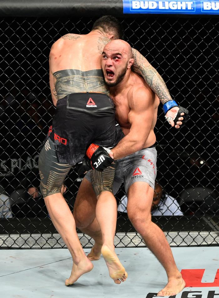 EDMONTON, AB - SEPTEMBER 09:  (R-L) Ilir Latifi of Sweden takes down Tyson Pedro of Australia in their light heavyweight bout during the UFC 215 event inside the Rogers Place on September 9, 2017 in Edmonton, Alberta, Canada. (Photo by Jeff Bottari/Zuffa LLC via Getty Images)