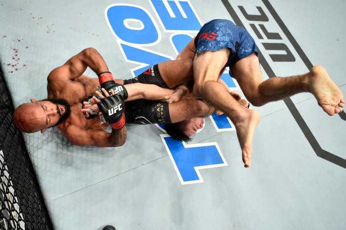 LAS VEGAS, NV - OCTOBER 07: Demetrious Johnson secures an arm bar submission against Ray Borg in their UFC flyweight championship bout during the UFC 216 event inside T-Mobile Arena on October 7, 2017 in Las Vegas, Nevada. (Photo by Jeff Bottari/Zuffa LLC/Zuffa LLC via Getty Images)