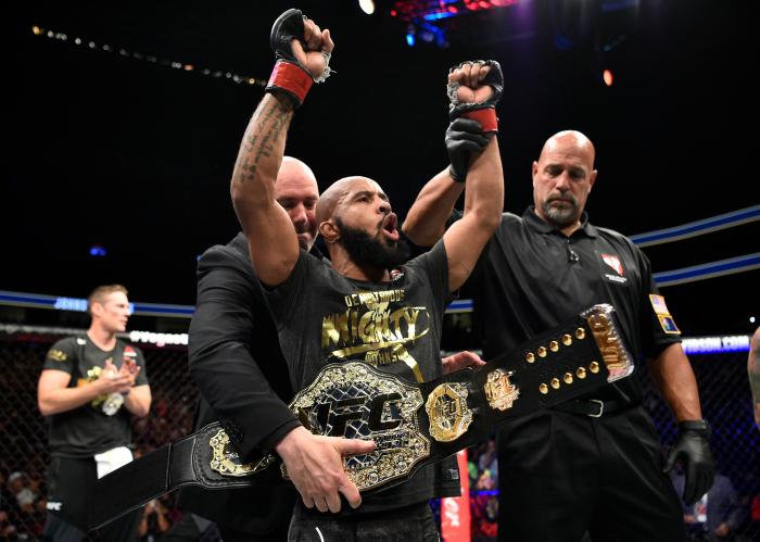 LAS VEGAS, NV - OCTOBER 07: Demetrious Johnson celebrates after his submission victory over Ray Borg in their UFC flyweight championship bout during the UFC 216 event inside T-Mobile Arena on October 7, 2017 in Las Vegas, Nevada. (Photo by Jeff Bottari/Zuffa LLC/Zuffa LLC via Getty Images)