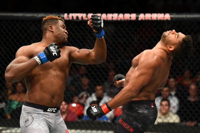 DETROIT, MI - DECEMBER 02: (L-R) Francis Ngannou of Cameroon punches Alistair Overeem of The Netherlands in their heavyweight bout during the UFC 218 event inside Little Caesars Arena on December 02, 2017 in Detroit, Michigan. (Photo by Josh Hedges/Zuffa LLC via Getty Images)