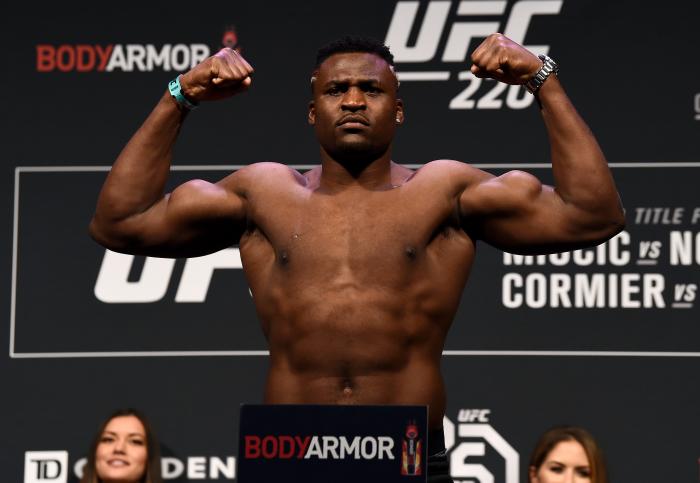 BOSTON, MA - JANUARY 19:  Francis Ngannou of Cameroon poses on the scale during the UFC 220 weigh-in at TD Garden on January 19, 2018 in Boston, Massachusetts. (Photo by Jeff Bottari/Zuffa LLC via Getty Images)