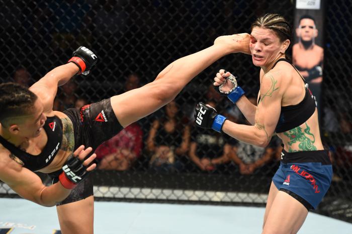 UTICA, NY - JUNE 01:  (L-R) Sijara Eubanks kicks Lauren Murphy in the face in their women's flyweight fight during the UFC Fight Night event at the Adirondack Bank Center on June 1, 2018 in Utica, New York. (Photo by Josh Hedges/Zuffa LLC via Getty Images)