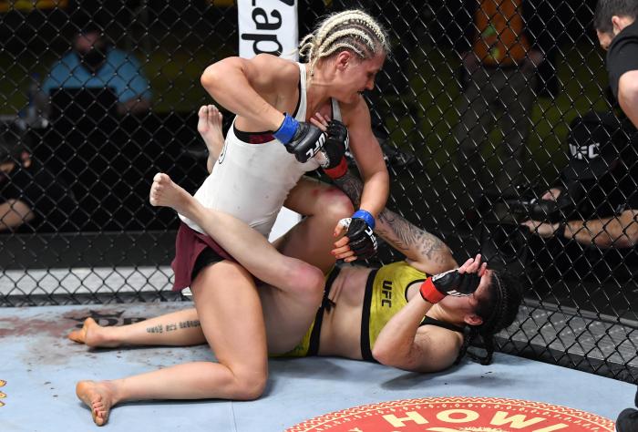 Yana Kunitskaya of Russia punches Ketlen Vieira of Brazil in a bantamweight bout during the UFC Fight Night event at UFC APEX on February 20, 2021 in Las Vegas, Nevada. (Photo by Chris Unger/Zuffa LLC