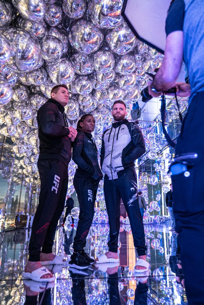 Marvin Vettori, Angela Hill and Calvin Kattar pose in new VENUM fight week gear during a photoshoot on February 28, 2022 inside the SUMMIT at ONE Vanderbuilt in New York, New York. (Photo by McKenzie Pavacich/Zuffa LLC)