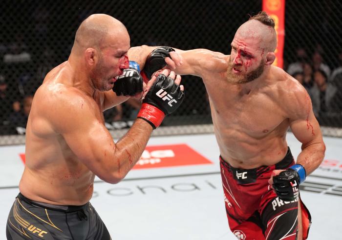 Jiri Prochazka of Czech Republic punches Glover Teixeira of Brazil in the UFC light heavyweight championship fight during the UFC 275 event at Singapore Indoor Stadium on June 12, 2022 in Singapore. (Photo by Jeff Bottari/Zuffa LLC)