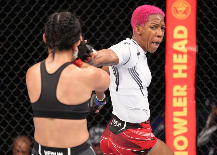 Joselyne Edwards lands a spinning back fist against Ramona Pascual at UFC 275