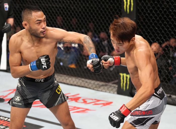 Josh Culibao punches SeungWoo Choi at UFC 275