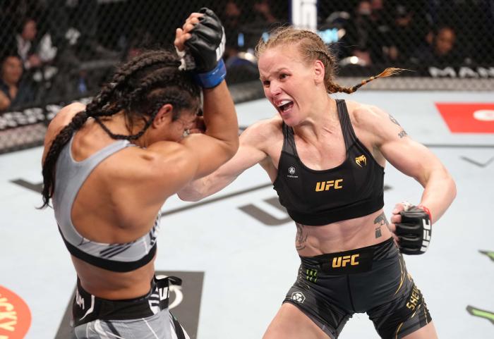 Valentina Shevchenko of Kyrgyzstan punches Taila Santos of Brazil in the UFC flyweight championship fight during the UFC 275 event at Singapore Indoor Stadium on June 12, 2022 in Singapore. (Photo by Jeff Bottari/Zuffa LLC)