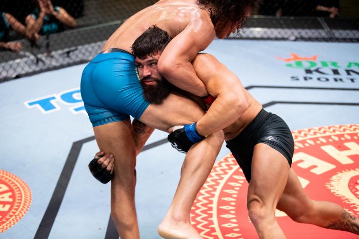 LAS VEGAS, NEVADA - MAY 20: (R-L) Andre Petroski takes down Bryan Battle in their middleweight bout during the filming of The Return of The Ultimate Fighter at UFC APEX on May 20, 2021 in Las Vegas, Nevada. (Photo by Chris Unger/Zuffa LLC)