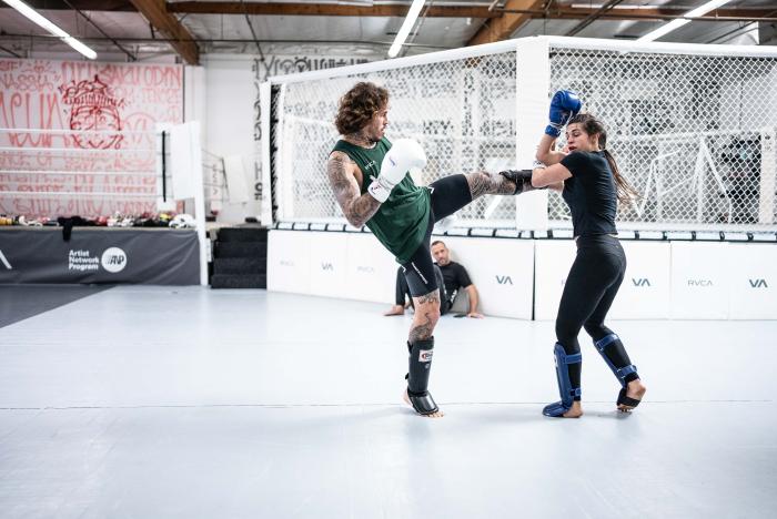Marlon Vera and Mackenzie Dern sparring together