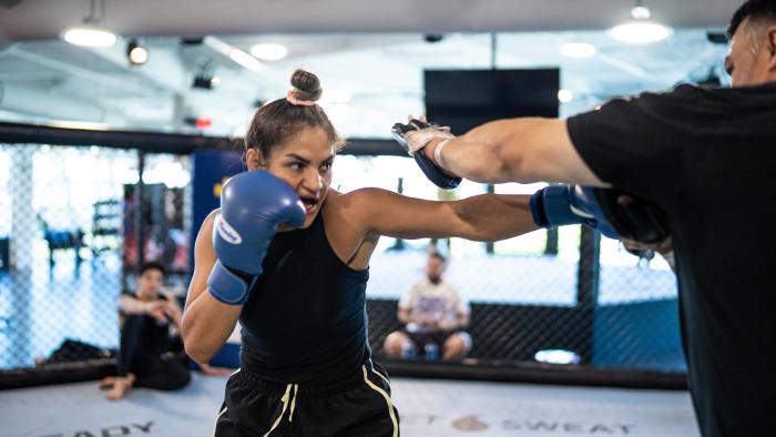LAS VEGAS 07/01/22 - UFC fighter Cynthia Calvillo training at the PI with boxing coach Jorge Capetillo and Brandon Moreno for her fight on July 9. (Photo by Juan Cardenas/Zuffa LLC)