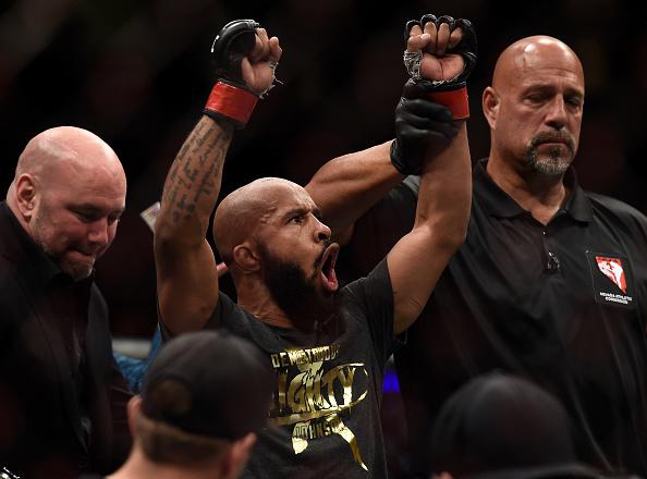 LAS VEGAS, NV - OCTOBER 07: Demetrious Johnson celebrates after his submission victory over Ray Borg in their UFC flyweight championship bout during the UFC 216 event inside T-Mobile Arena on October 7, 2017 in Las Vegas, Nevada. (Photo by Brandon Magnu