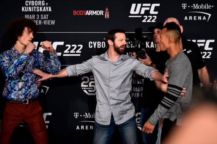 Opponents Sean O'Malley (L) and Andre Soukhamthath are separated by UFC matchmaker Sean Shelby (C) as they face off for media during the UFC 222 Ultimate Media Day at MGM Grand Hotel & Casino on March 1, 2018 in Las Vegas, Nevada. (Photo by Jeff Bottari/Z