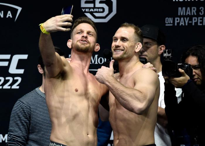 LAS VEGAS, NV - MARCH 02:   (L-R) Mike Pyle and Zak Ottow face off during a UFC 222 weigh-in on March 2, 2018 in Las Vegas, Nevada. (Photo by Jeff Bottari/Zuffa LLC)