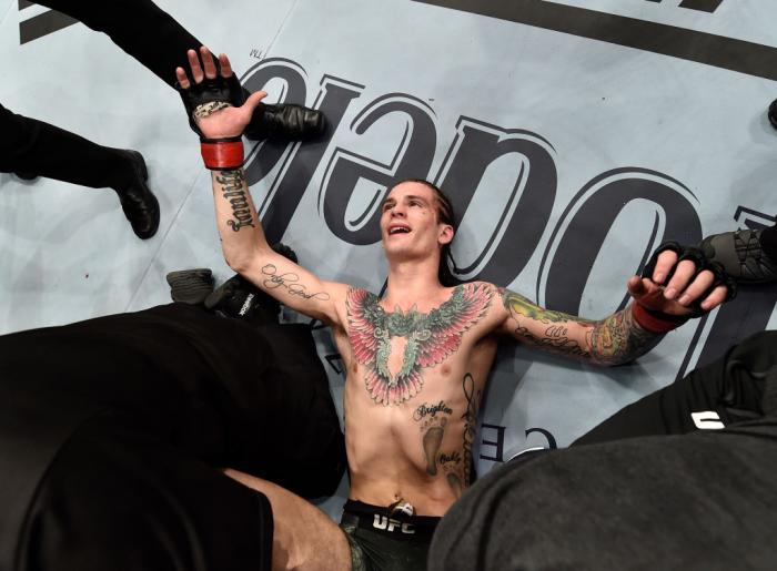 LAS VEGAS, NV - MARCH 03:   Sean O'Malley celebrates after his unanimous-decision victory over Andre Soukhamthath in their bantamweight bout during the UFC 222 event inside T-Mobile Arena on March 3, 2018 in Las Vegas, Nevada. (Photo by Jeff Bottari/Zuffa