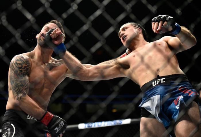 LAS VEGAS, NV - MARCH 03:   (R-L) Brian Ortega knocks out Frankie Edgar in their featherweight bout during the UFC 222 event inside T-Mobile Arena on March 3, 2018 in Las Vegas, Nevada. (Photo by Brandon Magnus/Zuffa LLC/Zuffa LLC via Getty Images)