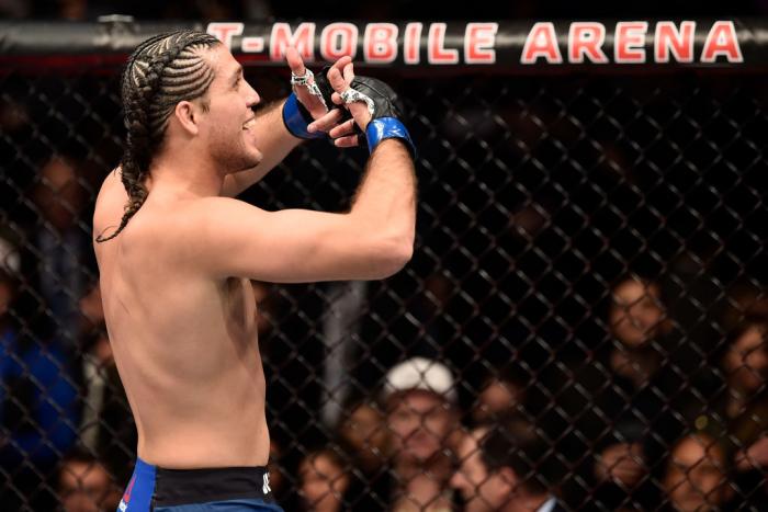 LAS VEGAS, NV - MARCH 03:   Brian Ortega celebrates after his knockout victory over Frankie Edgar in their featherweight bout during the UFC 222 event inside T-Mobile Arena on March 3, 2018 in Las Vegas, Nevada. (Photo by Jeff Bottari/Zuffa LLC)