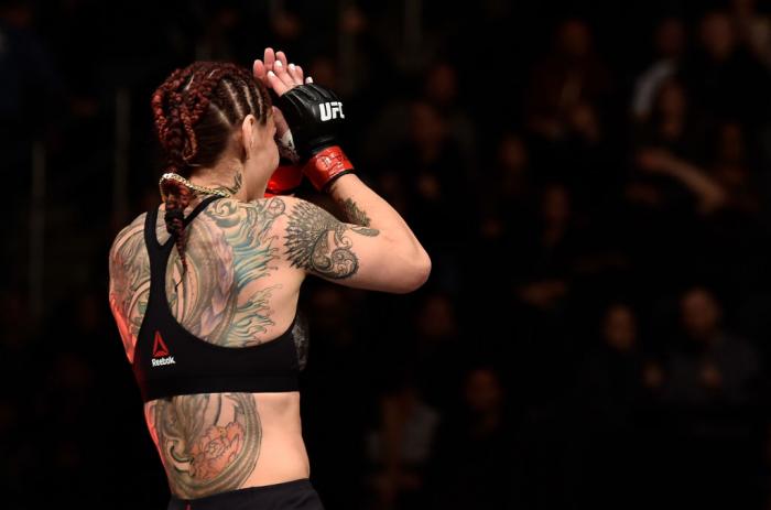 LAS VEGAS, NV - MARCH 03: Cris Cyborg of Brazil celebrates after her TKO victory over Yana Kunitskaya of Russia in their women's featherweight bout during the UFC 222 event inside T-Mobile Arena on March 3, 2018 in Las Vegas, Nevada. (Photo by Jeff Bott