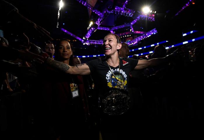 LAS VEGAS, NV - MARCH 03: Cris Cyborg of Brazil celebrates after her TKO victory over Yana Kunitskaya of Russia in their women's featherweight bout during the UFC 222 event inside T-Mobile Arena on March 3, 2018 in Las Vegas, Nevada. (Photo by Brandon M
