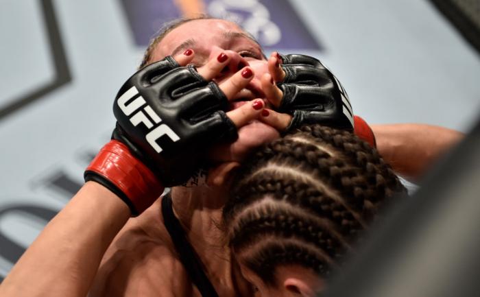 BROOKLYN, NEW YORK - APRIL 07:  (L-R) Felice Herrig attempts to take down Karolina Kowalkiewicz of Poland in their women's strawweight bout during the UFC 223 event inside Barclays Center on April 7, 2018 in Brooklyn, New York. (Photo by Jeff Bottari/Zuff