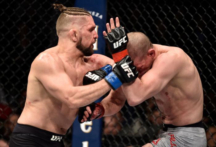 BROOKLYN, NEW YORK - APRIL 07: (L-R) Chris Gruetzemacher elbows Joe Lauzon in their lightweight bout during the UFC 223 event inside Barclays Center on April 7, 2018 in Brooklyn, New York. (Photo by Jeff Bottari/Zuffa LLC/Zuffa LLC via Getty Images)