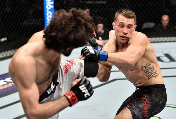 BROOKLYN, NEW YORK - APRIL 07:  (L-R) Zabit Magomedsharipov of Russia  kicks Kyle Bochniak in their featherweight bout during the UFC 223 event inside Barclays Center on April 7, 2018 in Brooklyn, New York. (Photo by Jeff Bottari/Zuffa LLC/Zuffa LLC via G