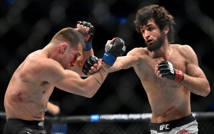 BROOKLYN, NEW YORK - APRIL 07: (R-L) Zabit Magomedsharipov of Russia punches Kyle Bochniak in their featherweight bout during the UFC 223 event inside Barclays Center on April 7, 2018 in Brooklyn, New York. (Photo by Brandon Magnus/Zuffa LLC/Zuffa LLC v