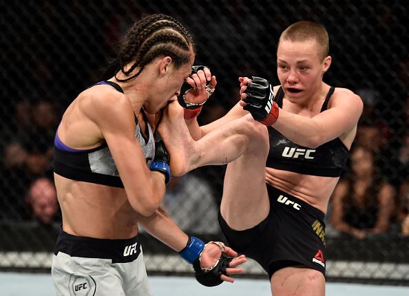 BROOKLYN, NEW YORK - APRIL 07: (R-L) Rose Namajunas kicks Joanna Jedrzejczyk of Poland in their women's strawweight title bout during the UFC 223 event inside Barclays Center on April 7, 2018 in Brooklyn, New York. (Photo by Jeff Bottari/Zuffa LLC/Zuffa