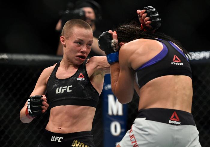 BROOKLYN, NEW YORK - APRIL 07:  (L-R) Rose Namajunas punches Joanna Jedrzejczyk of Poland in their women's strawweight title bout during the UFC 223 event inside Barclays Center on April 7, 2018 in Brooklyn, New York. (Photo by Brandon Magnus/Zuffa LLC/Zu