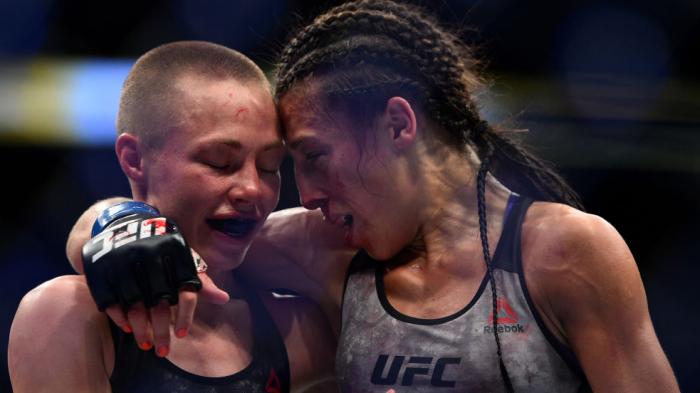 BROOKLYN, NEW YORK - APRIL 07: (L-R) Opponents Rose Namajunas and Joanna Jedrzejczyk of Poland embraces after the conclusion of their women's strawweight title bout during the UFC 223 event inside Barclays Center on April 7, 2018 in Brooklyn, New York. (