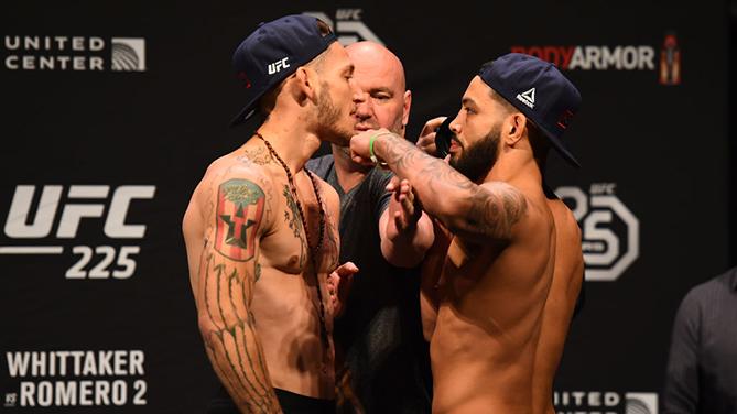 CHICAGO, ILLINOIS - JUNE 08: (L-R) Opponents Mike Santiago and Dan Ige face off during the UFC 225 weigh-in at the United Center on June 8, 2018 in Chicago, Illinois. (Photo by Josh Hedges/Zuffa LLC/Zuffa LLC via Getty Images)