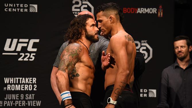 CHICAGO, ILLINOIS - JUNE 08:  (L-R) Opponents Clay Guida and Charles Oliveira face off during the UFC 225 weigh-in at the United Center on June 8, 2018 in Chicago, Illinois. (Photo by Josh Hedges/Zuffa LLC/Zuffa LLC via Getty Images)