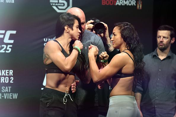 CHICAGO, ILLINOIS - JUNE 08: (L-R) Opponents Claudia Gadelha of Brazil and Carla Esparza face off during the UFC 225 weigh-in at the United Center on June 8, 2018 in Chicago, Illinois. (Photo by Josh Hedges/Zuffa LLC/Zuffa LLC via Getty Images)