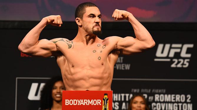 CHICAGO, ILLINOIS - JUNE 08: UFC Middleweight Champion Robert Whittaker of New Zealand poses on the scale during the UFC 225 weigh-in at the United Center on June 8, 2018 in Chicago, Illinois. (Photo by Josh Hedges/Zuffa LLC/Zuffa LLC via Getty Images)