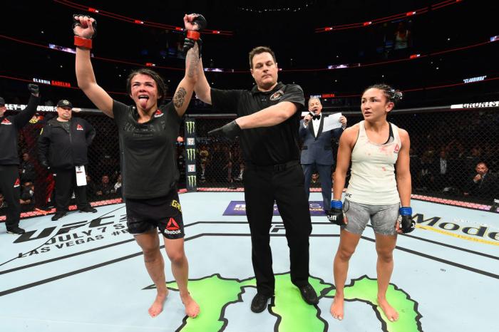 CHICAGO, ILLINOIS - JUNE 09:  (L-R) Claudia Gadelha of Brazil reacts after defeating Carla Esparza in their women's strawweight fight during the UFC 225 event at the United Center on June 9, 2018 in Chicago, Illinois. (Photo by Josh Hedges/Zuffa LLC/Zuffa