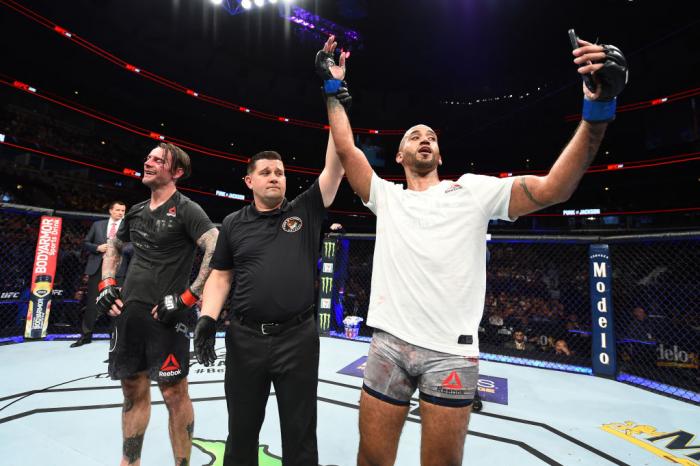 CHICAGO, ILLINOIS - JUNE 09: (R-L) Mike Jackson celebrates after defeating CM Punk in their welterweight fight during the UFC 225 event at the United Center on June 9, 2018 in Chicago, Illinois. (Photo by Josh Hedges/Zuffa LLC/Zuffa LLC via Getty Images)
