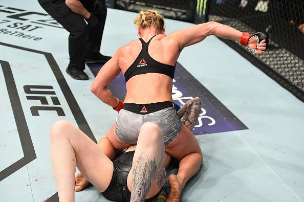 CHICAGO, ILLINOIS - JUNE 09: (L-R) Holly Holm controls the body of Megan Anderson of Australia in their women's featherweight fight during the UFC 225 event at the United Center on June 9, 2018 in Chicago, Illinois. (Photo by Josh Hedges/Zuffa LLC/Zuffa
