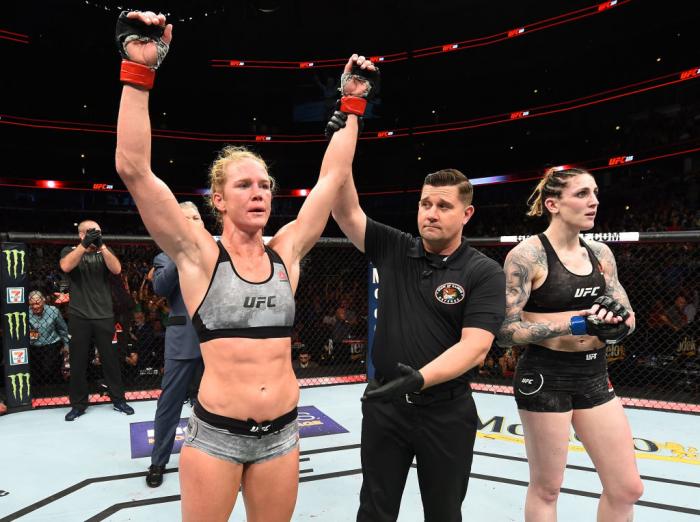 CHICAGO, ILLINOIS - JUNE 09: (L-R) Holly Holm celebrates after defeating Megan Anderson of Australia in their women's featherweight fight during the UFC 225 event at the United Center on June 9, 2018 in Chicago, Illinois. (Photo by Josh Hedges/Zuffa LLC/