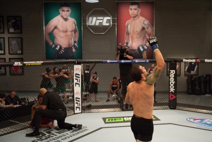 LAS VEGAS, NV - MARCH 24: (R-L) Cesar Arzamendia celebrates his victory over Oliver Meza during the filming of The Ultimate Fighter Latin America: Team Gastelum vs Team Escudero on March 24, 2015 in Las Vegas, Nevada. (Photo by Brandon Magnus/Zuffa LLC/